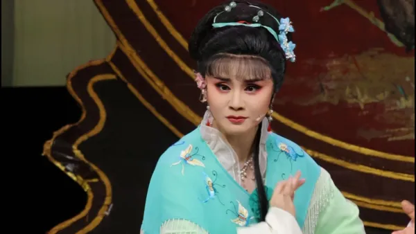 爹爹逼儿上轿行
